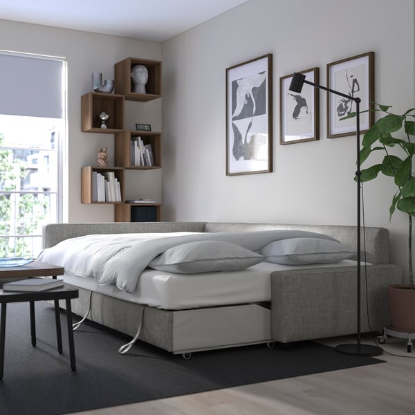FRIHETEN - Corner sofa bed/container, Faringe light gray