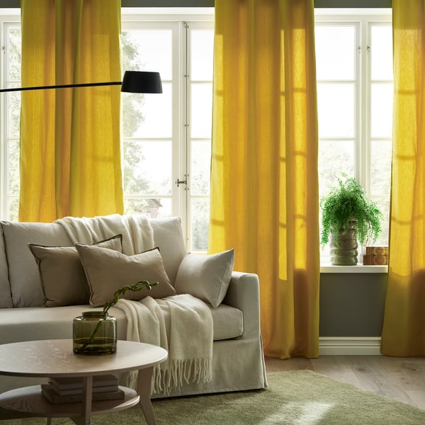 GINSTMOTT curtains, 1 pair, yellow/with heading tape, 145x300 cm