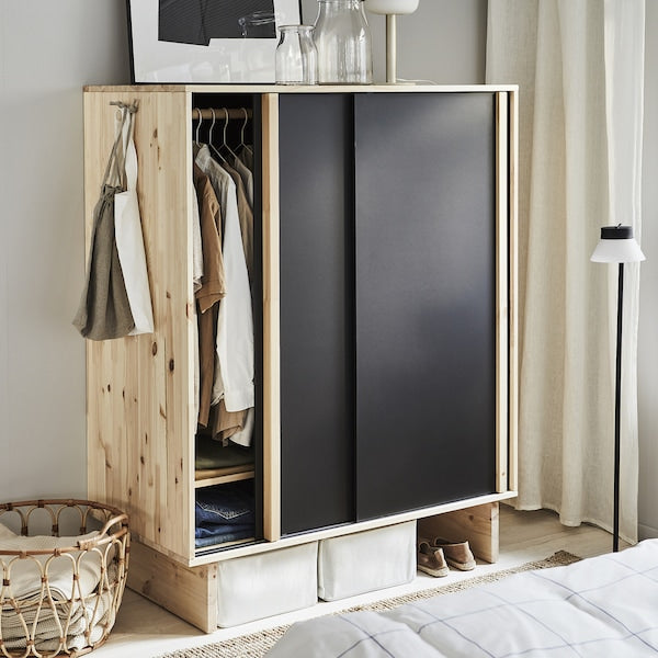 GLAMBERGET - Wardrobe with 3 sliding doors, pine/black, 117x63x150 cm