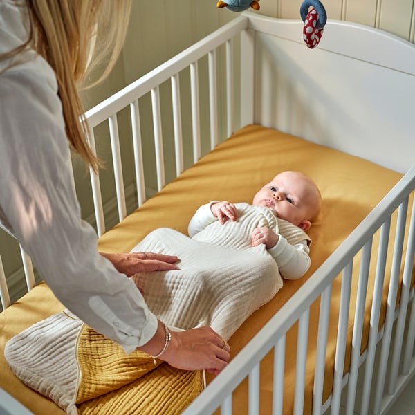 GULDVÄVARE sleep bag, beige/dark yellow, 0-6 months