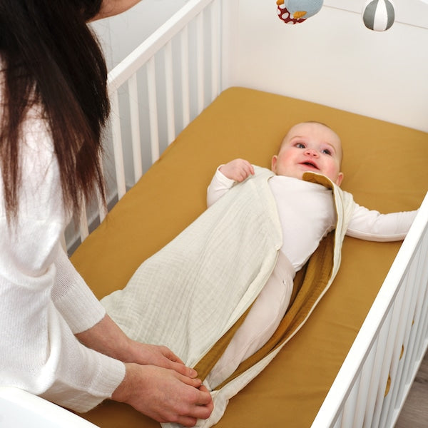 GULDVÄVARE sleep bag, beige/dark yellow, 0-6 months