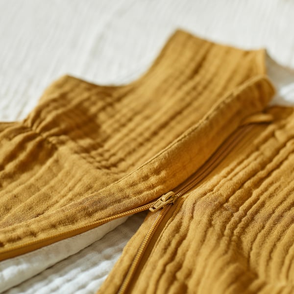 GULDVÄVARE sleep bag, dark yellow/beige, 6-18 months