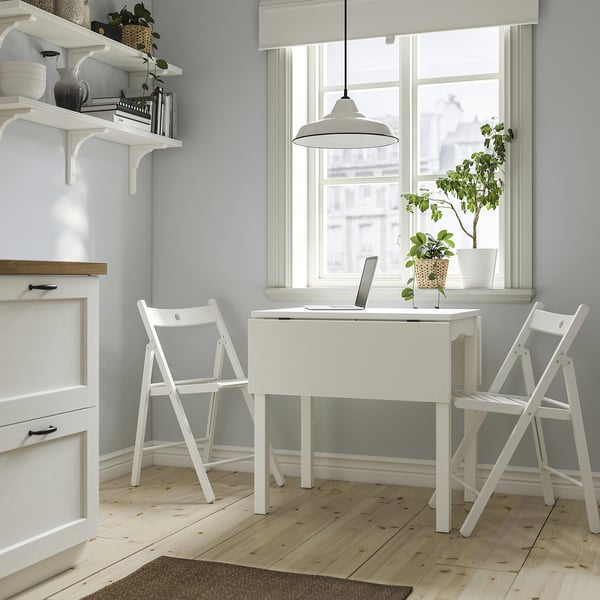 HAUGA / FRÖSVI table and 2 folding chairs, white/white, 55/82/109x74 cm