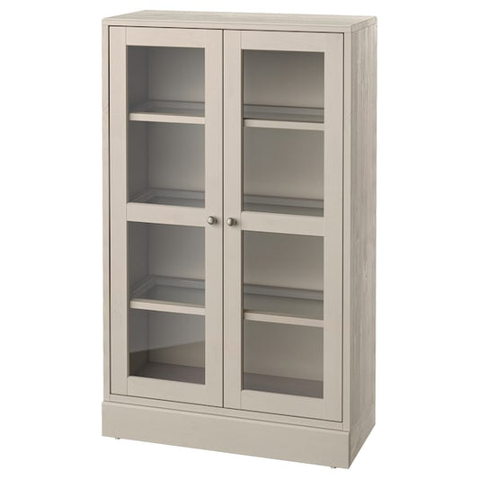 HAVSTA - Glass-door cabinet with plinth, grey-beige/clear glass, 81x37x134 cm