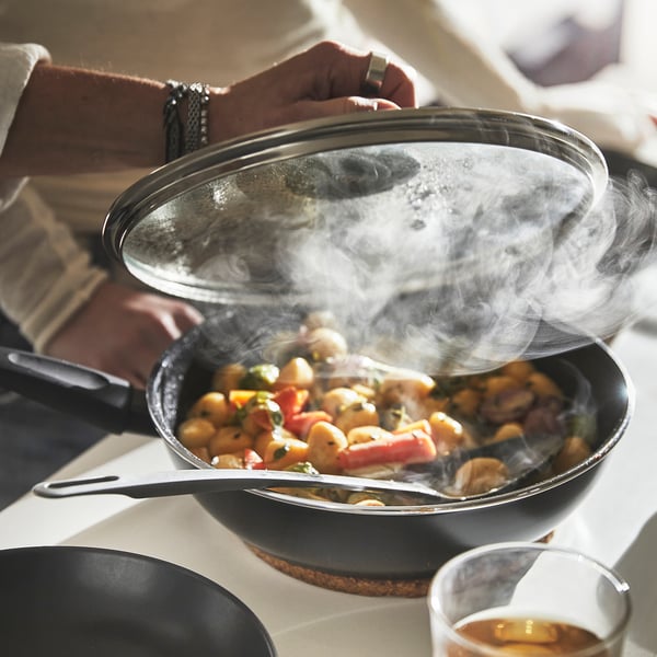 HEMLAGAD sauté pan with lid, non-stick coating black, 26 cm