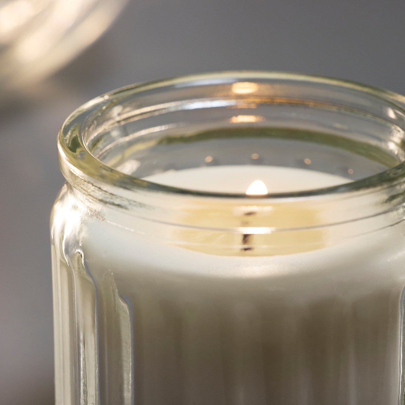 HÖKGÖK scented candle in glass, Vanilla pale beige, 12 hr