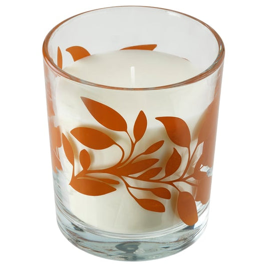 HÖSTAGILLE scented glass candle, Vanilla and apple clear/orange glass, 50 h - IKEA United Kingdom