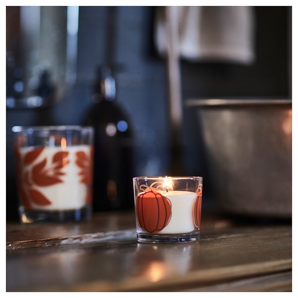 HÖSTAGILLE scented glass candle, Spiced pumpkin clear/orange glass, 20 h - IKEA United Kingdom