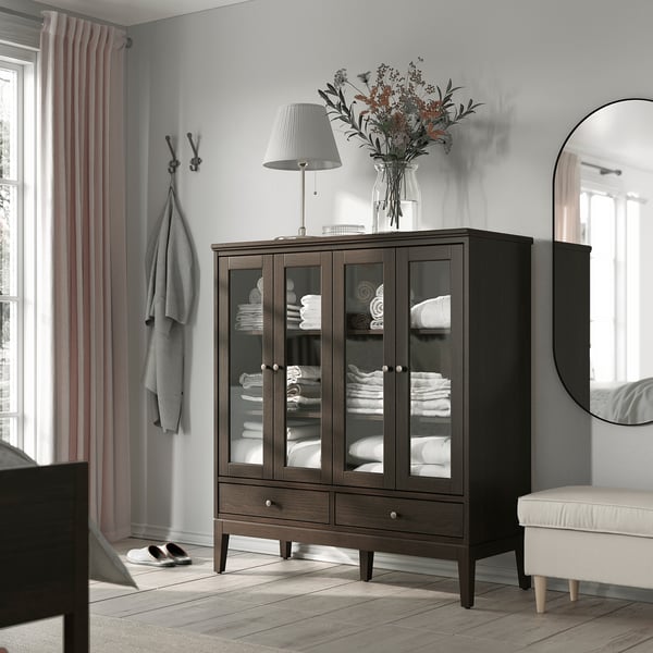 IDANÄS cabinet with bi-folded glass doors, dark brown stained, 121x50x135 cm