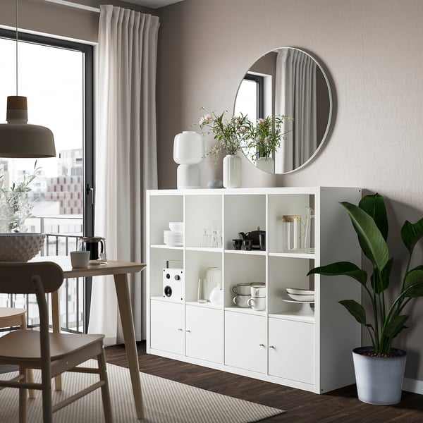 KALLAX shelving unit with 4 inserts, white, 147x112 cm