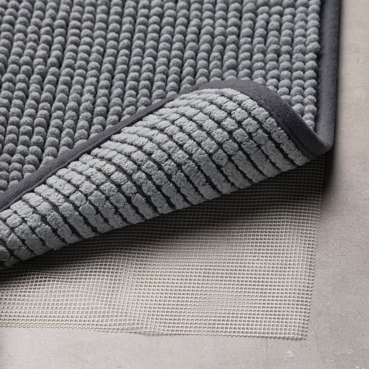 KUSTBEVAKARE bath mat, grey, 40x60 cm