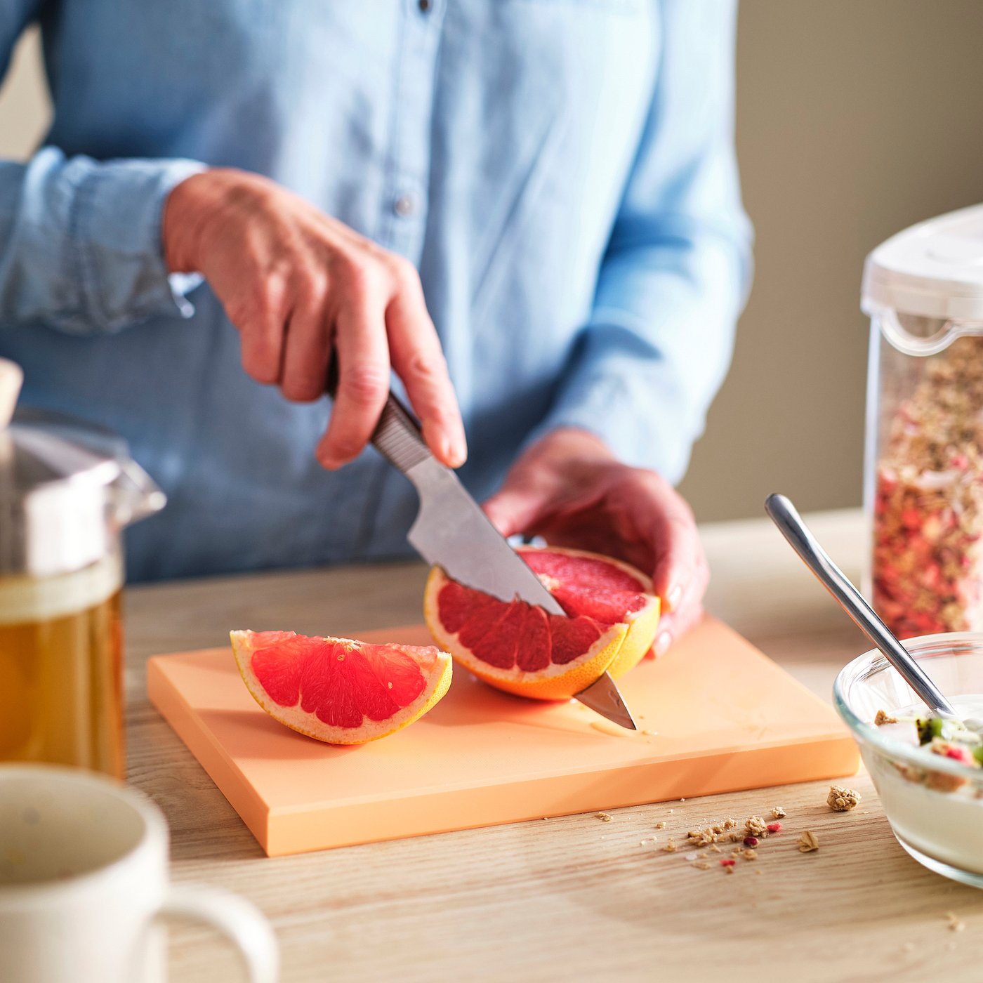 KUSTHOPPARE chopping board, light orange, 25x16.5 cm