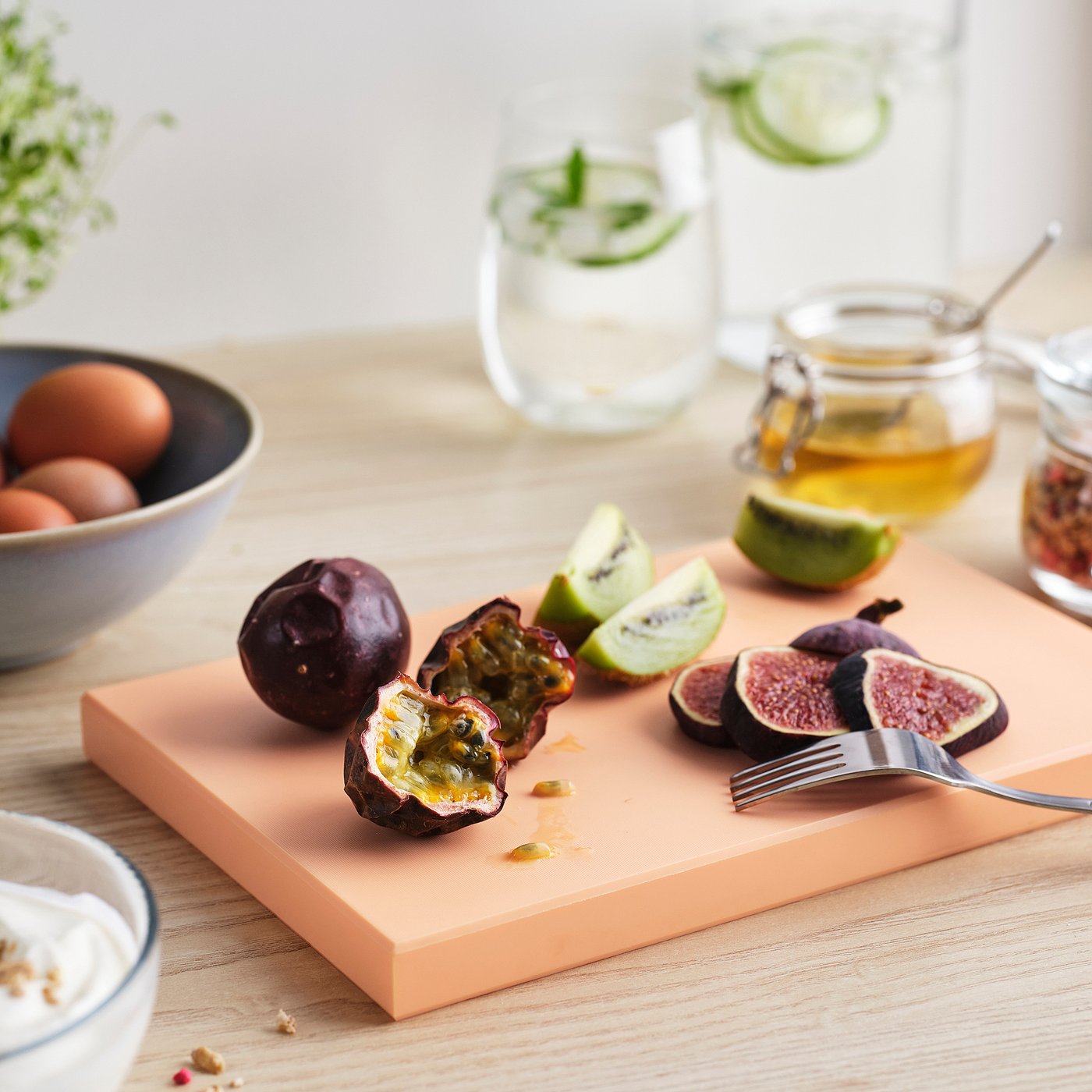 KUSTHOPPARE chopping board, light orange, 25x17 cm