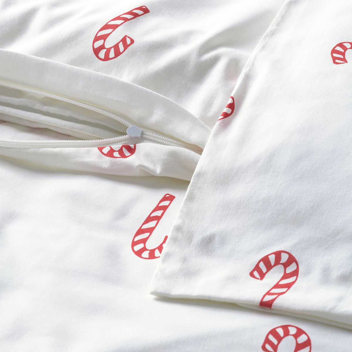 LÖVSÅNGARE duvet cover 1 pillowcase for cot, candy cane pattern, 110x125/35x55 cm