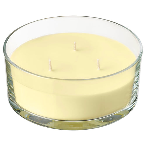 LOTSFÅGEL scented candle in glass, 3 wicks, Citrus flower light yellow, 25 hr