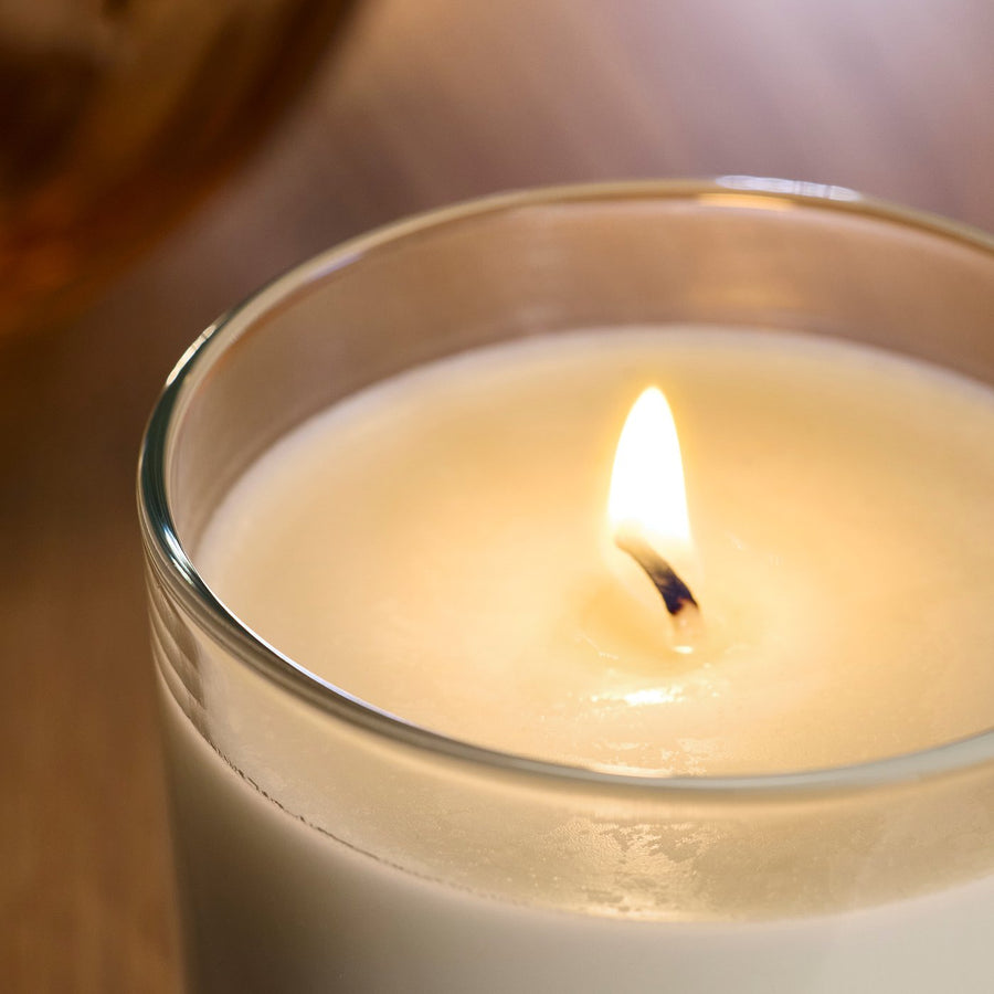 LOTSFÅGEL scented candle in glass, Vanilla pale beige, 40 hr