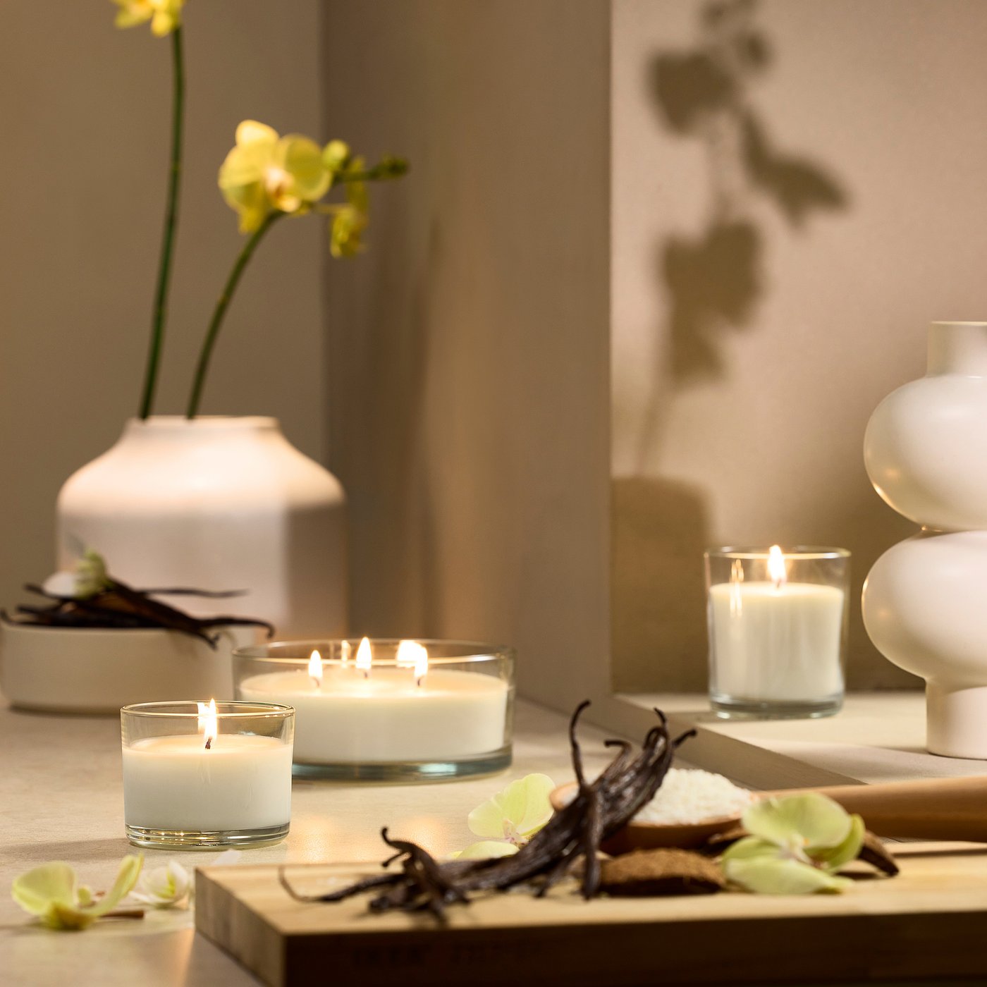 LOTSFÅGEL scented candle in glass, Vanilla pale beige, 8 cm