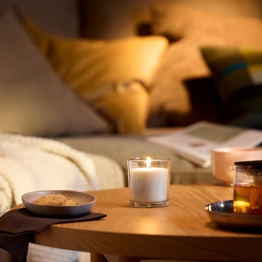 LOTSFÅGEL scented candle in glass, Vanilla pale beige, 40 hr