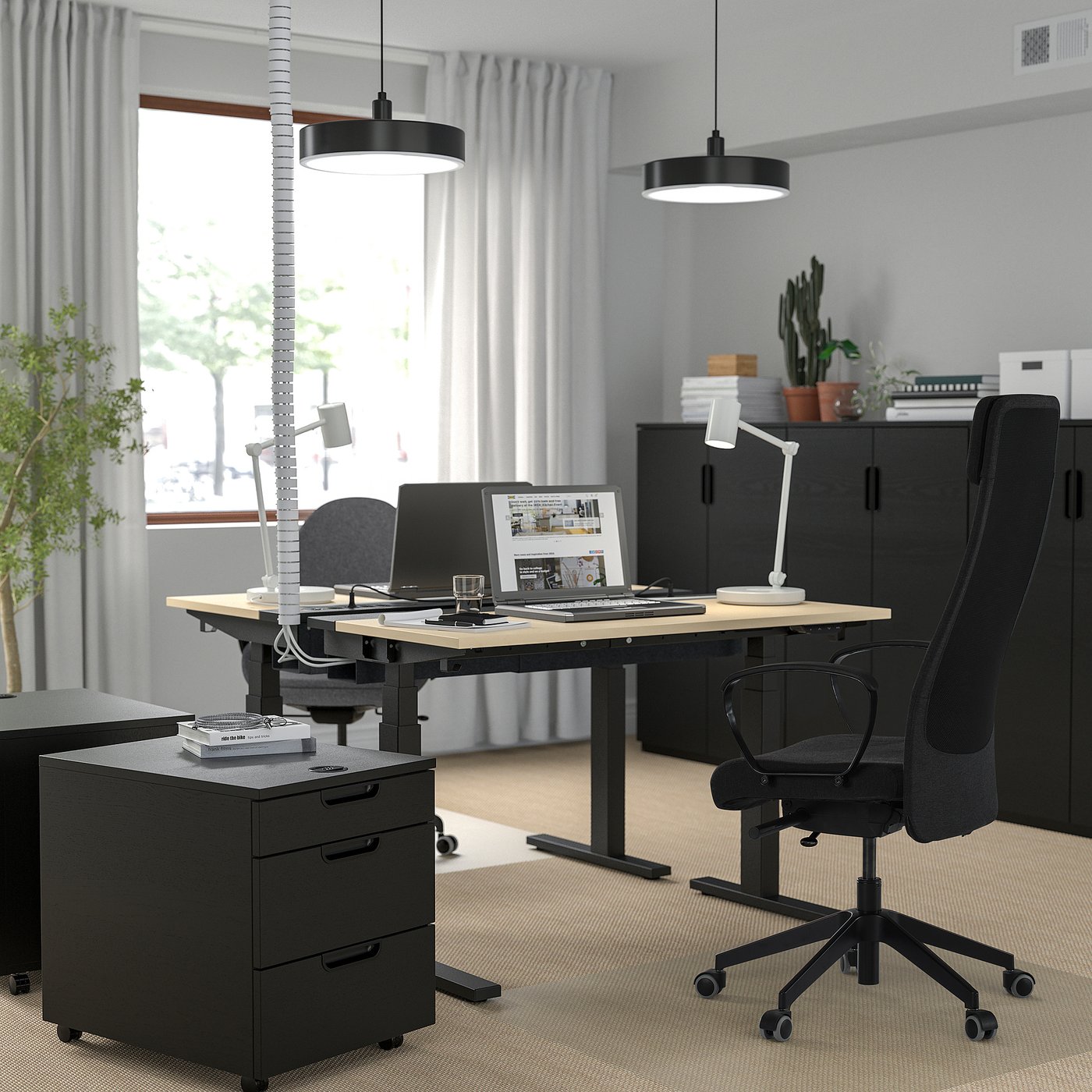MARKUS office chair with armrests, with floor protector dark grey, 71 cm