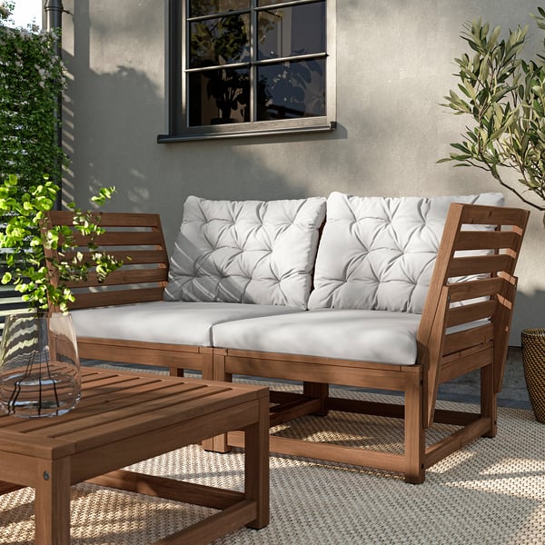 NÄMMARÖ 2-seat modular sofa, outdoor, armrests light brown stained/Kuddarna light grey-beige, 147 cm