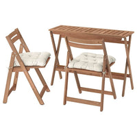 NÄMMARÖ table and 2 folding chairs, outdoor, foldable light brown stained/Kuddarna light grey-beige, 108x37 cm