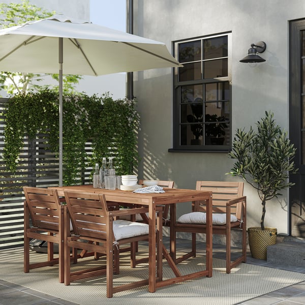 NÄMMARÖ table+4 chairs w armrests, outdoor, light brown stained/Kuddarna light grey-beige, 140x75 cm