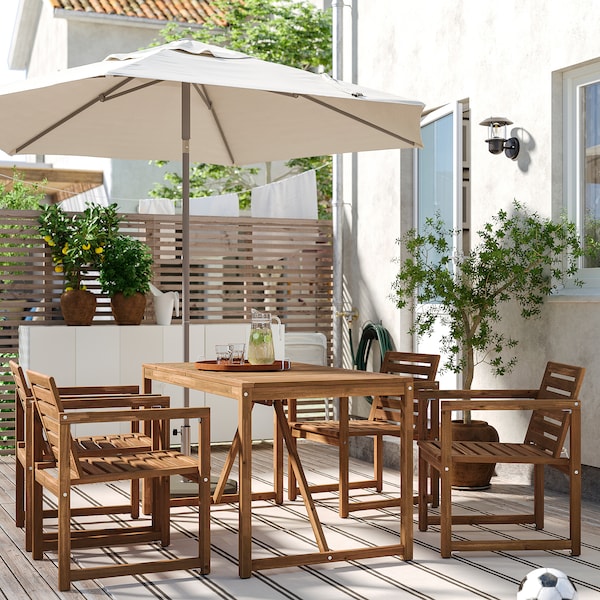 NÄMMARÖ - Table+4 chairs w armrests, outdoor, light brown stained, 140 cm