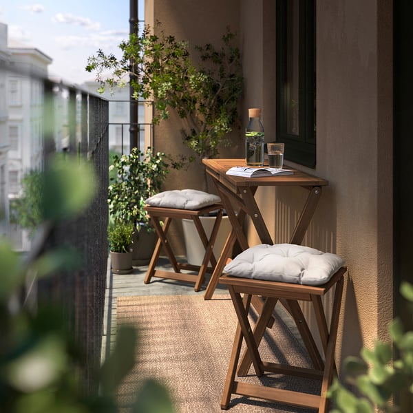 NÄMMARÖ - Table and 2 garden stools, mordant light brown folding/folding Kuddarna light gray-beige,108x37 cm
