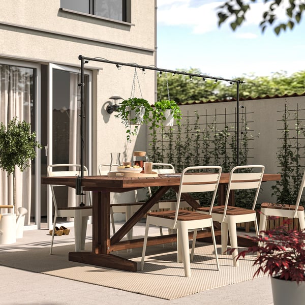 NORRMANSÖ / HELGEÖ table with decorating rod, outdoor acacia/black, 220 cm