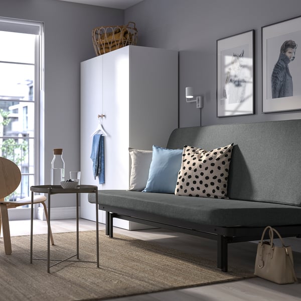 NYHAMN 3-seat sofa-bed, with pocket spring mattress/Skartofta black/light grey, 200x90x97 cm
