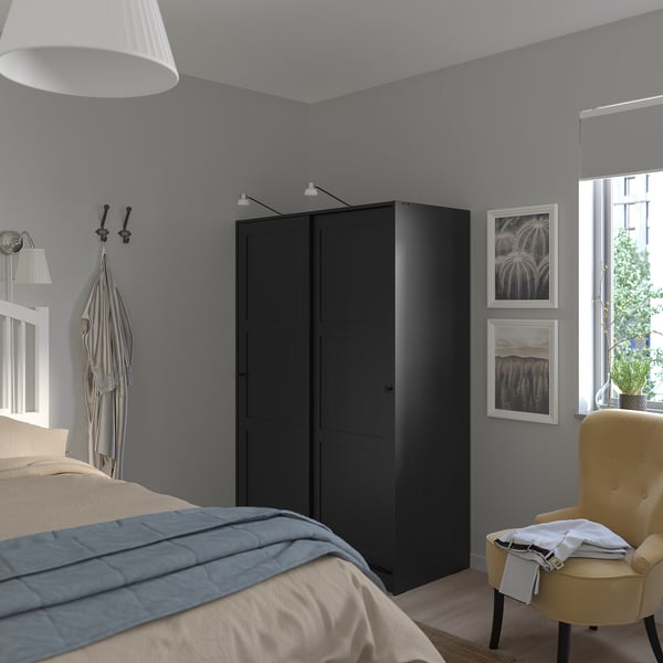 RAKKESTAD wardrobe with sliding doors, black-brown, 117x176 cm