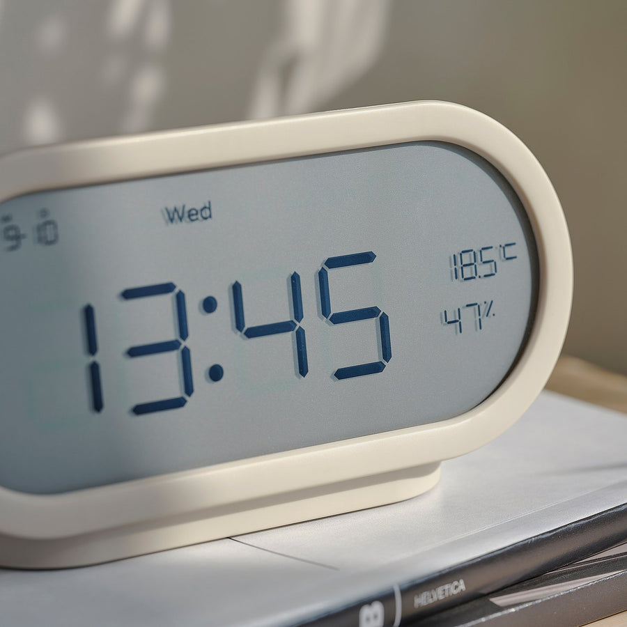 RÖDSTRÄFSE alarm clock with hygro-/thermometer, beige, 17x8x6 cm
