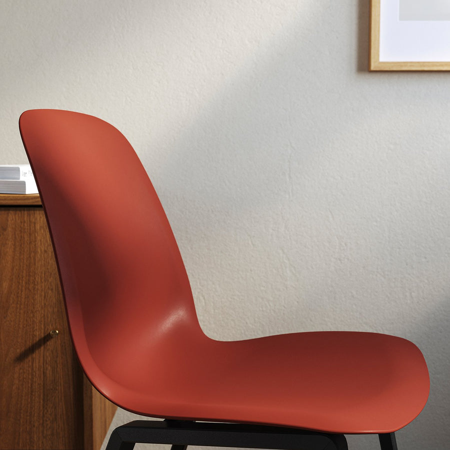 SKÅLSTA table and 4 chairs, walnut effect U-shaped black-grey/plastic red profiled metal/black-grey, 140x80 cm