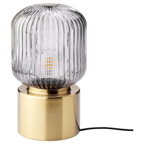 SOLKLINT table lamp, brass/grey clear glass, 28 cm