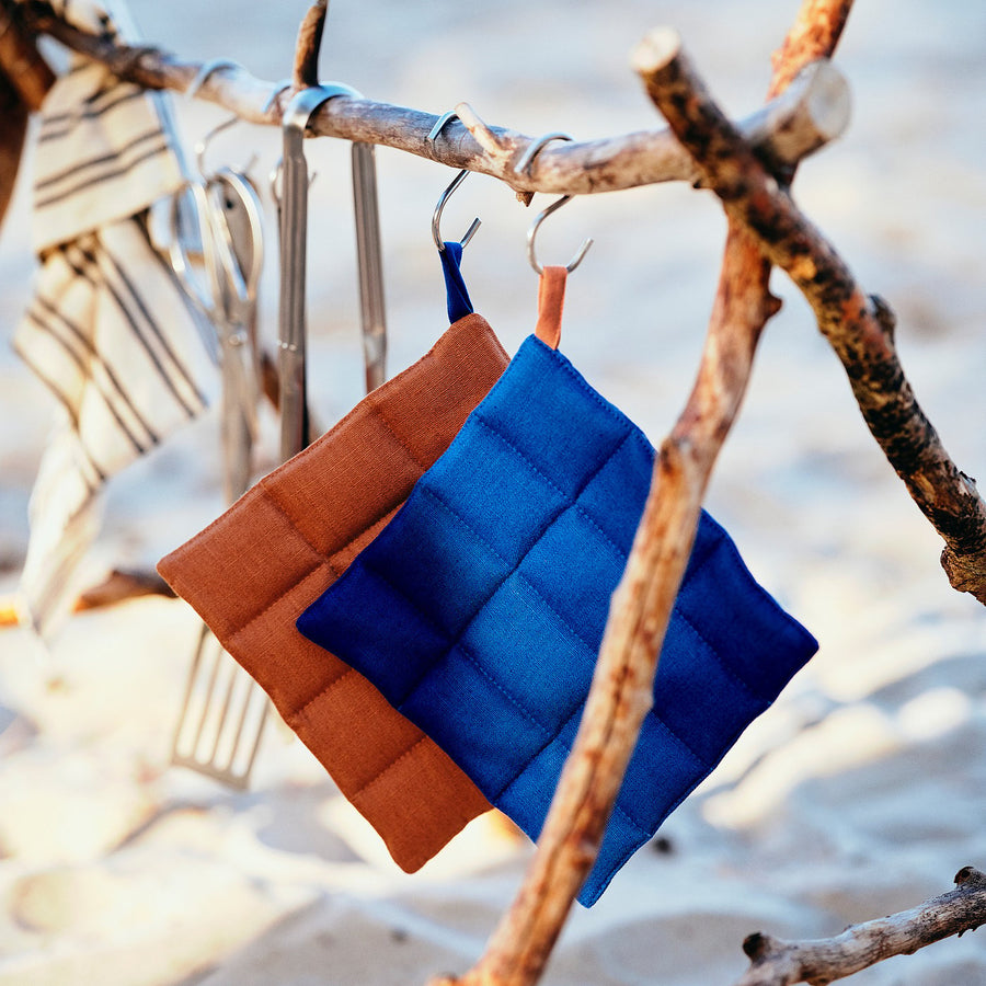 SOLUPPGÅNG pot holder, blue/brown, 21x21 cm, 2 pack