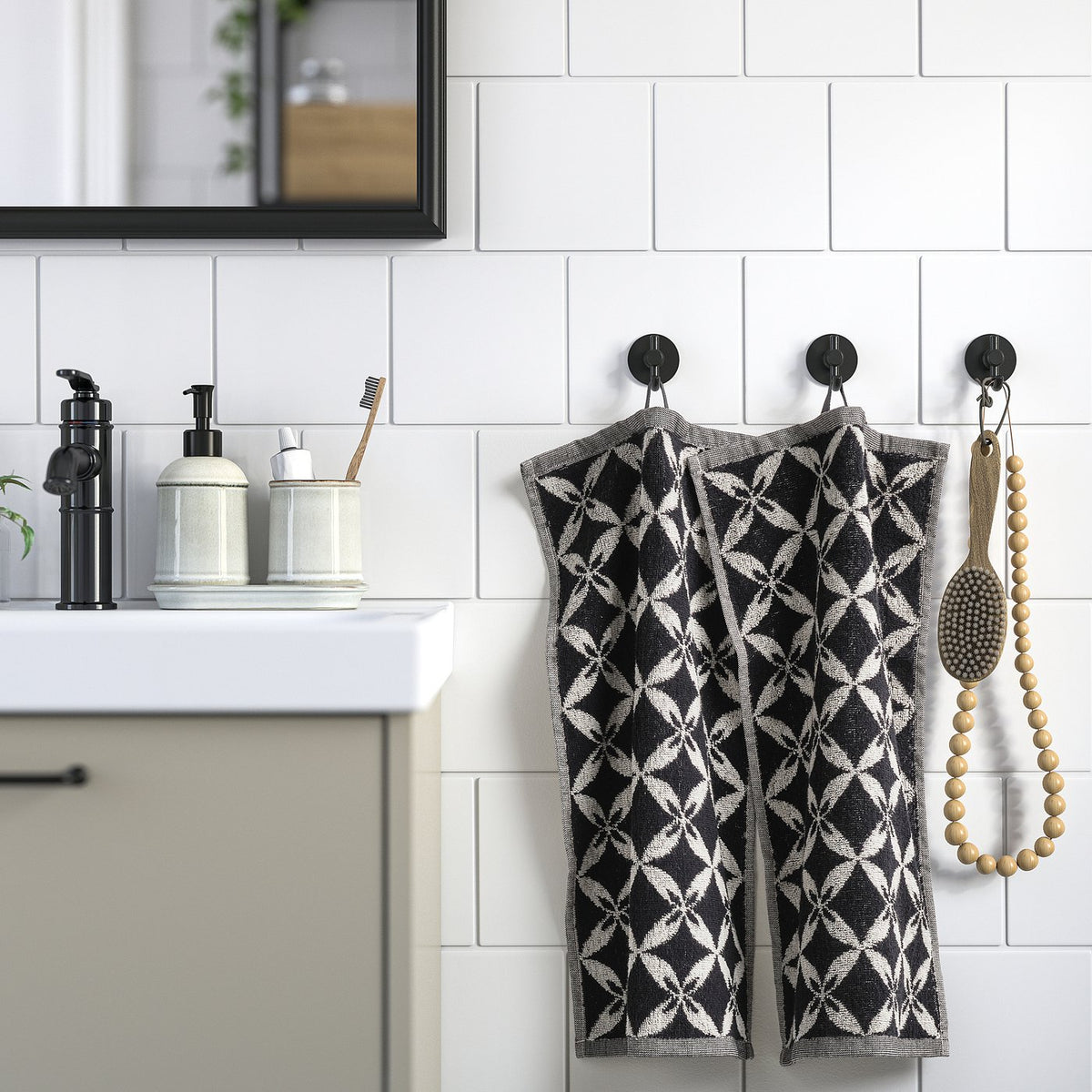 SPÄRRKRUSBÄR guest towel, beige/black, 30x50 cm, 2 pack