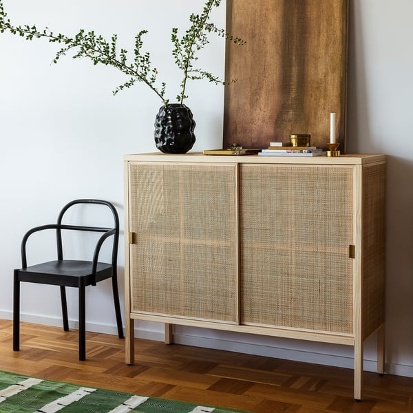 STOCKHOLM 2025 cabinet with sliding doors, rattan/pine, 125x47x110 cm