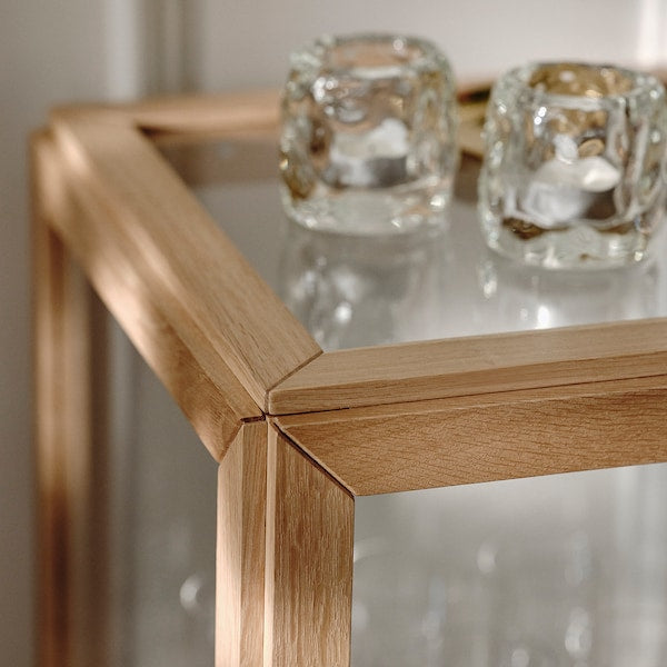 STOCKHOLM 2025 - Glass-door cabinet, oak veneer, 100x40x86 cm