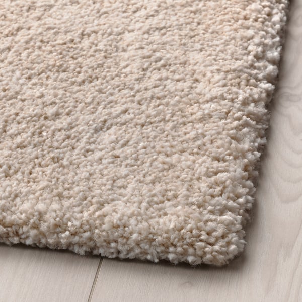 STOENSE rug, low pile, off-white, 133x195 cm