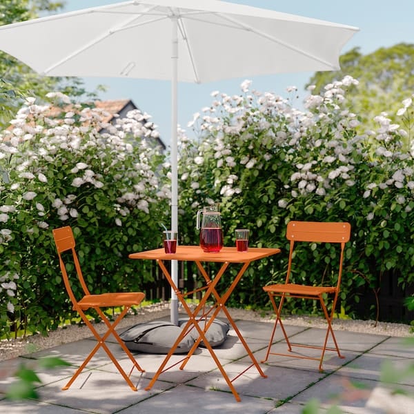 Ikea SUNDSÖ - Foldable table and 2 chairs, outdoor bright orange/ bright orange,65x65 cm