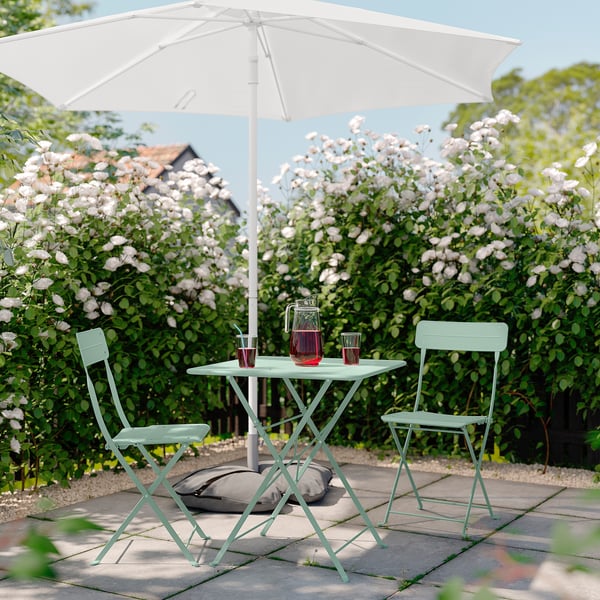SUNDSÖ table and 2 folding chairs, outdoor light green/light green, 65x65 cm