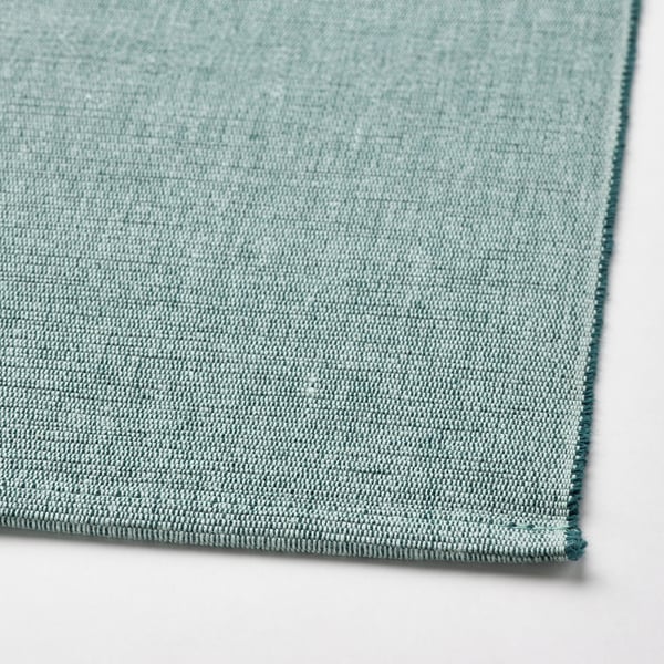 SVARTSENAP place mat, green-blue, 35x45 cm
