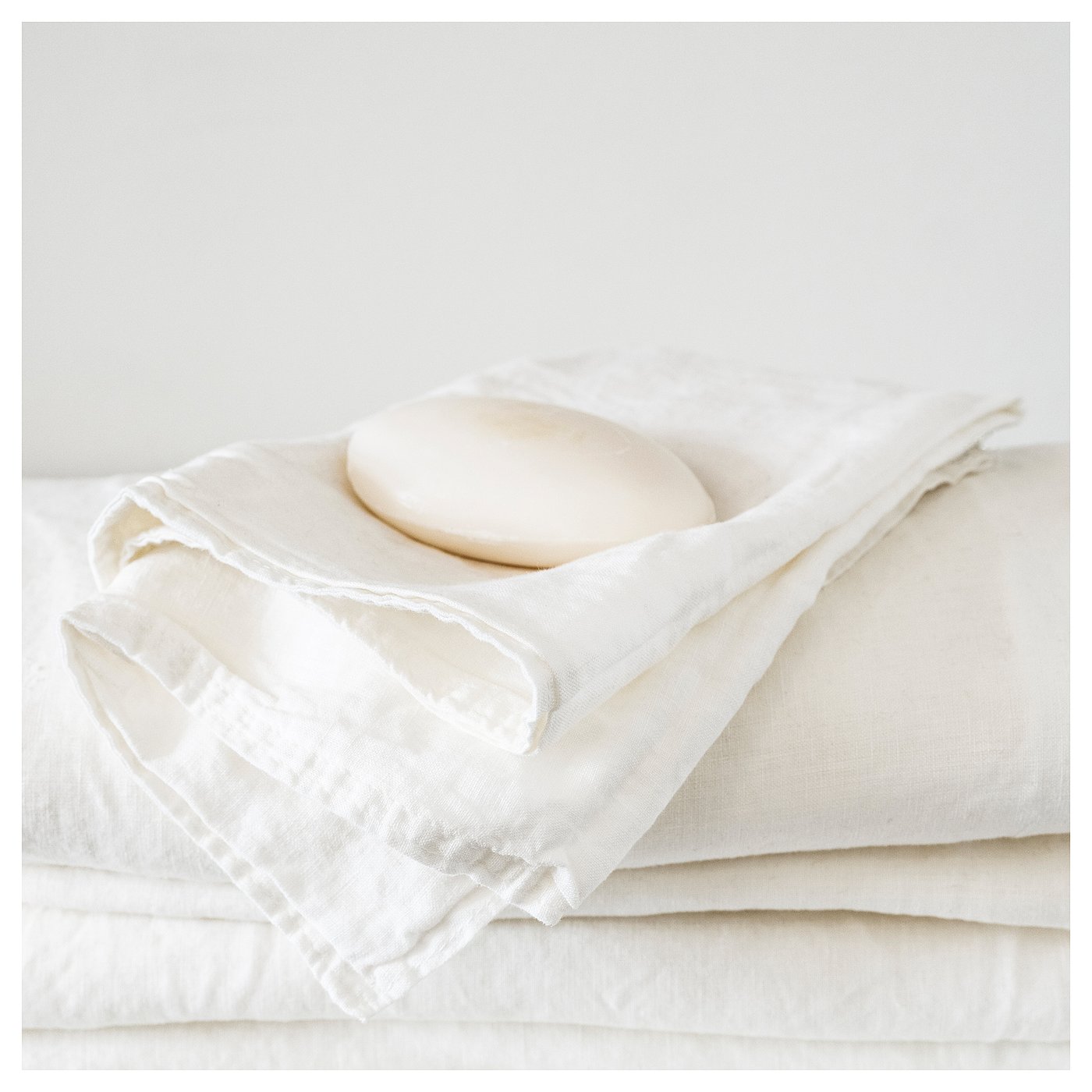 TOFSTÄRNA scented candle in glass, 2 wicks, Fresh linen clear glass, 10 cm