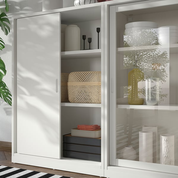 TONSTAD storage combination w sliding doors, off-white/clear glass, 201x37x116 cm