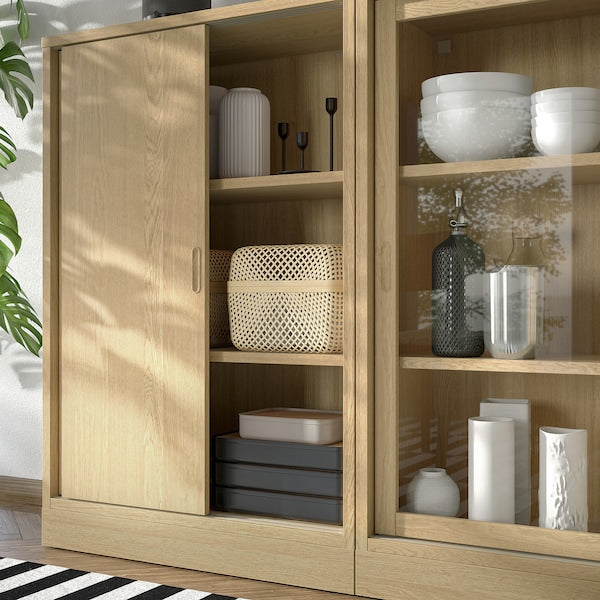 TONSTAD - Storage combination w sliding doors, oak veneer/clear glass, 202x37x120 cm