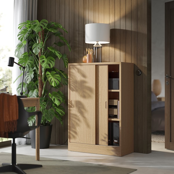 TONSTAD - Cabinet with sliding doors, oak veneer, 82x37x120 cm