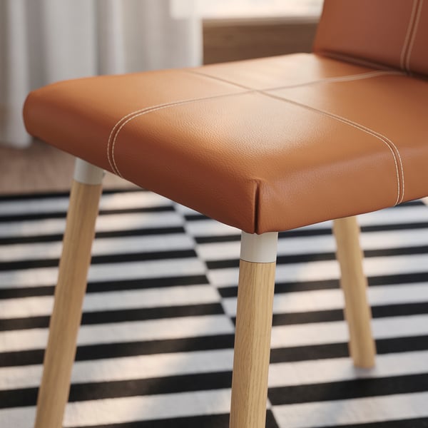 TONSTAD / TONSTAD - Table and 4 chairs, oak effect/Bomstad ochre brown oak effect, 150x80 cm - Table length: 150 cm Table width: 80 cm Table height: 75 cm Chair width: 42 cm Chair depth: 56 cm Chair height: 86 cm.