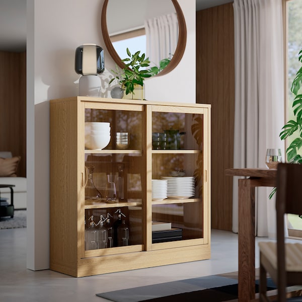 TONSTAD - Cabinet with sliding glass doors, oak veneer, 121x37x120 cm