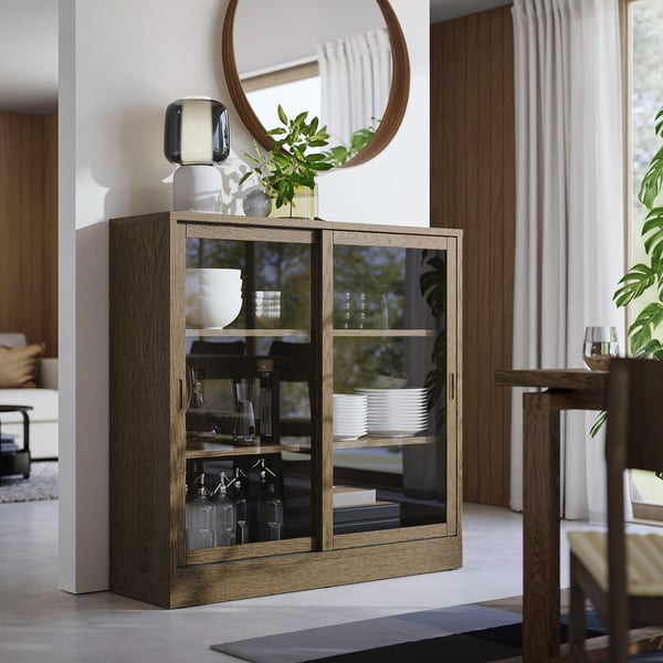TONSTAD cabinet with sliding glass doors, brown stained oak veneer, 121x37x120 cm