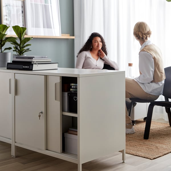 TROTTEN cabinet with sliding doors, white, 80x55x75 cm